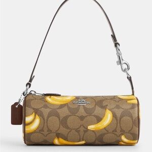 Coach Nolita Barrel Bag In Signature Canvas With Banana Print CR368
